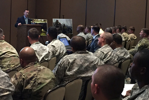 USDA Deputy Under Secretary Lanon Baccam talks futures in Ag for veterans to a packed house at a Ft. Bliss transitions summit in El Paso, Texas.